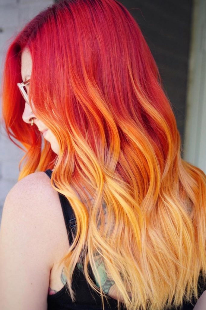 This bold look is not for the faint of heart. With deep red and bright orange and yellow streaks, this look is definitely a show stopper!