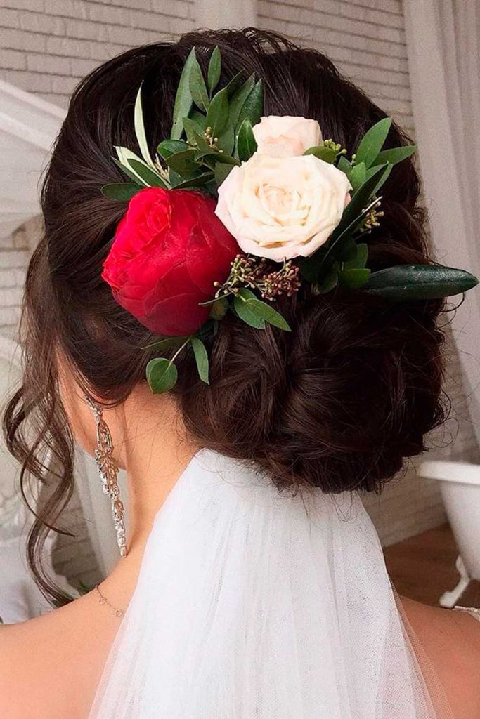 Gentle Swept Back Hairstyle With Floral Accessory