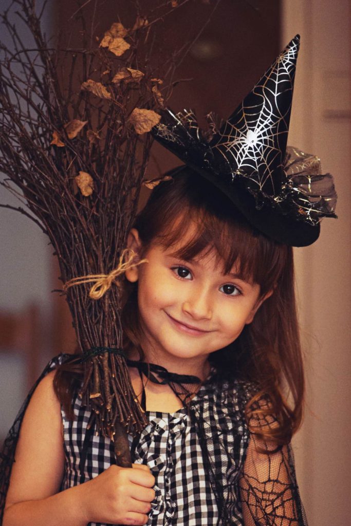 Is your girl a little witch this Halloween? Let her powers prosper! Pick a hairstyle that a hat could complement.