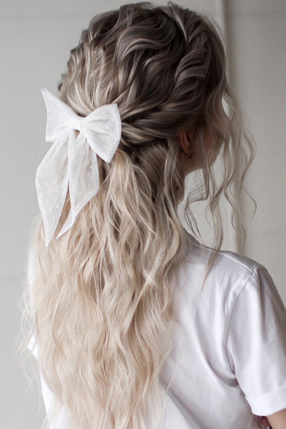 Cute Wedding Hairstyle With A Bow