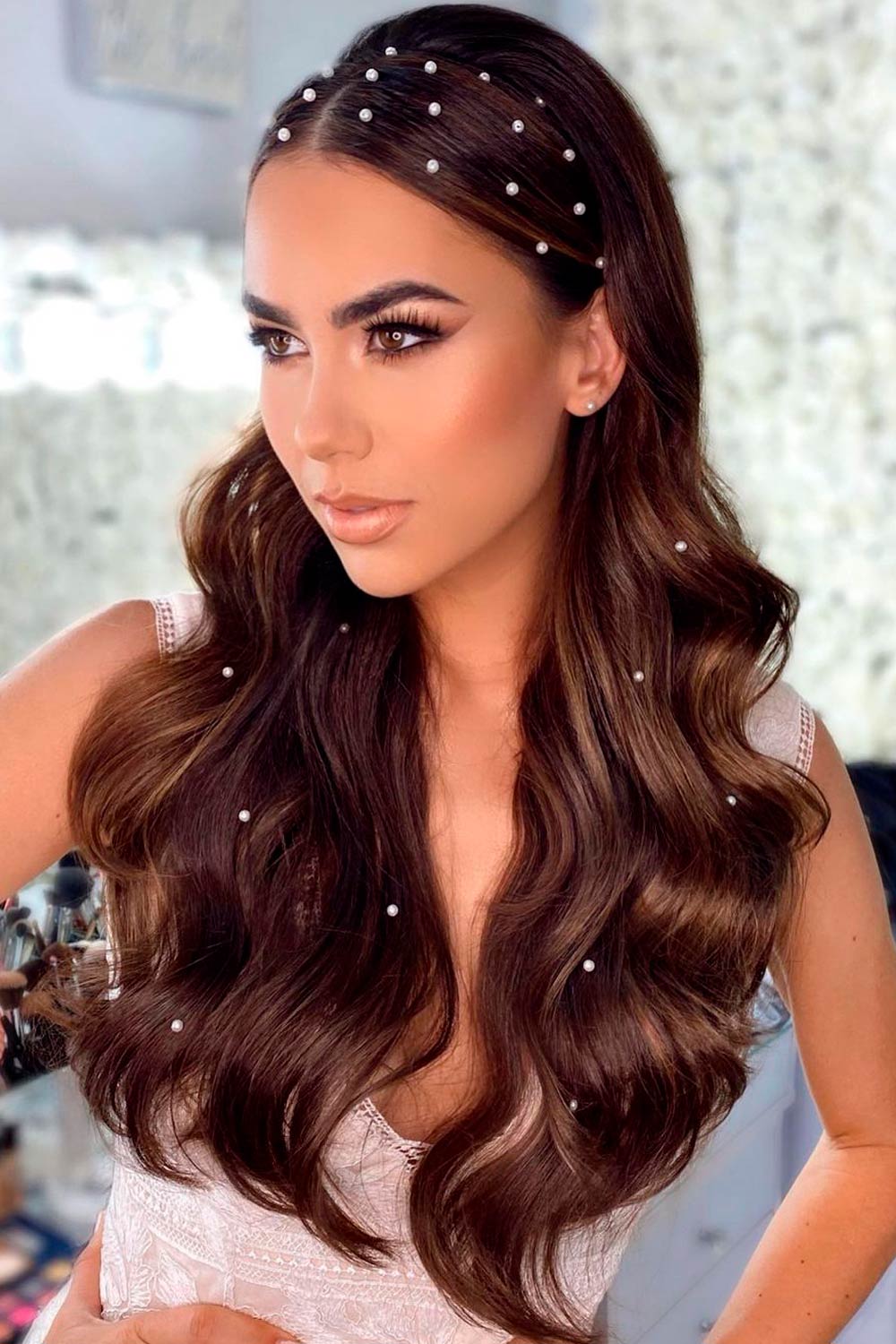 Do not be afraid to add some glitz and glam to your Christmas hair styles