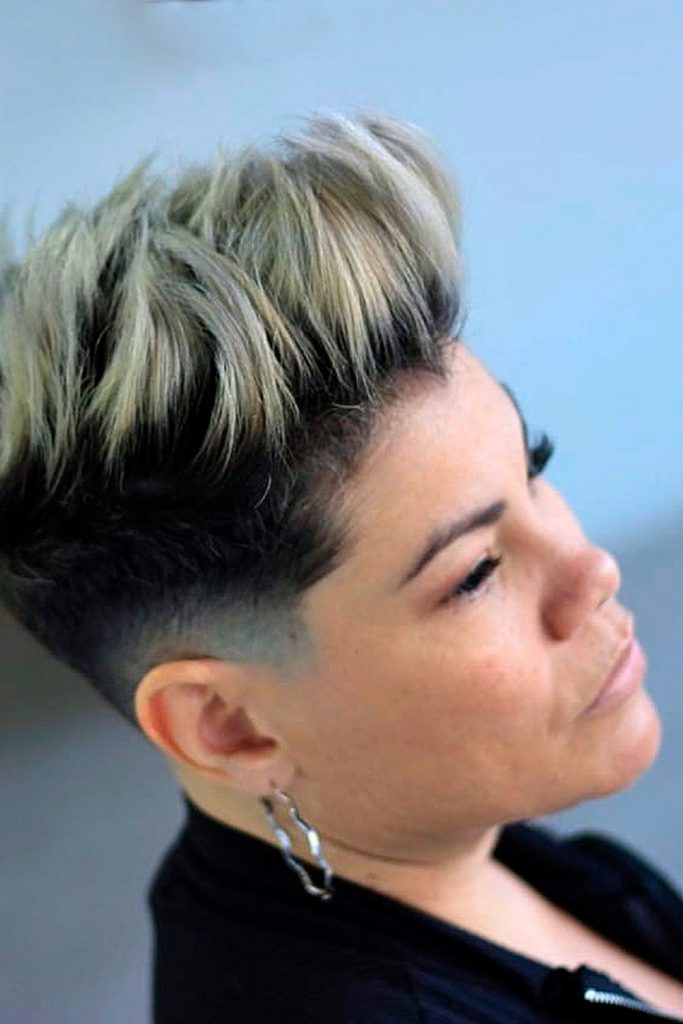 If you want to emphasize the fine line between femininity and strength can use this frosted pixie with a mid fade as a perfect source of inspiration