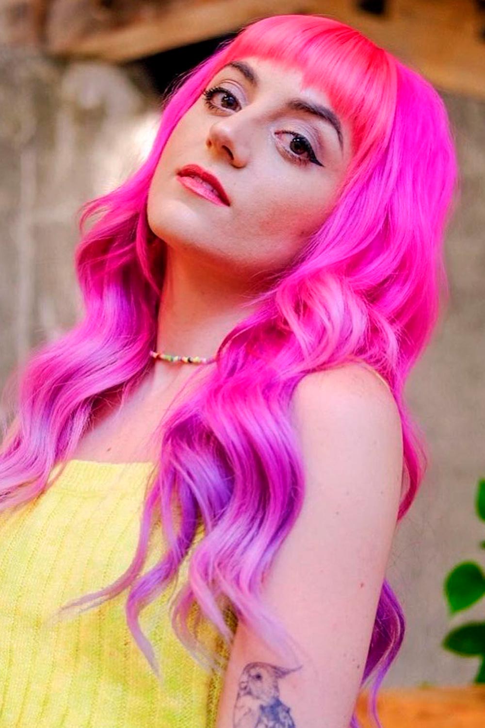 Bright Pink Ombre Colored Hair with Dyed Bangs
