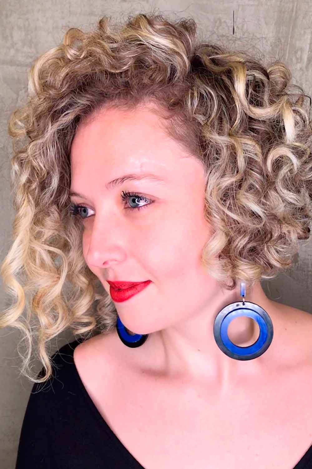 Dark Blond Hair In Stylish Curls