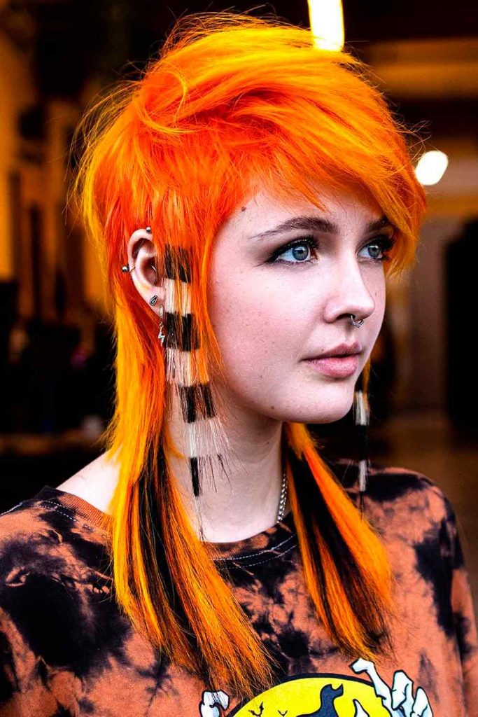 Neon Orange Shag Mullet With Zebra-Styled Side Locks