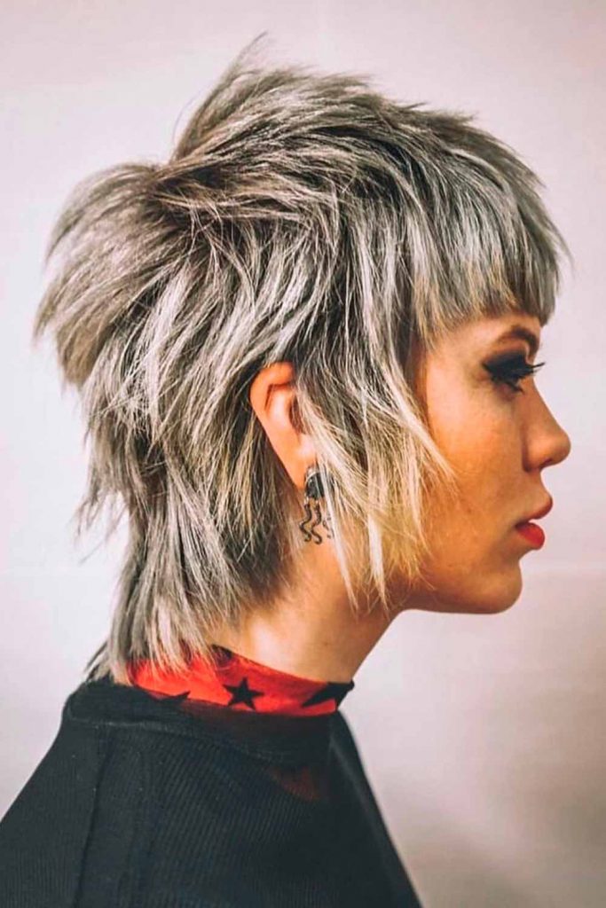 Female Mullet Platinum Blond Messy Thick Bangs 683x1024 