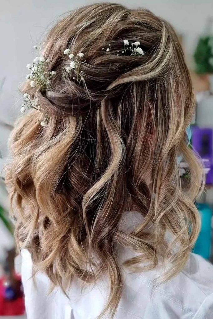 Messy Half-Up Hairstyle With Floral Accessories