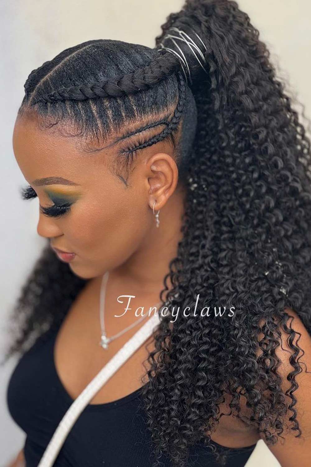 Sleek Curly High Ponytail with Braids