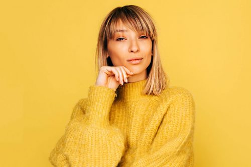 New Ways To Style Your Long Bob Haircut With Bangs This Fall