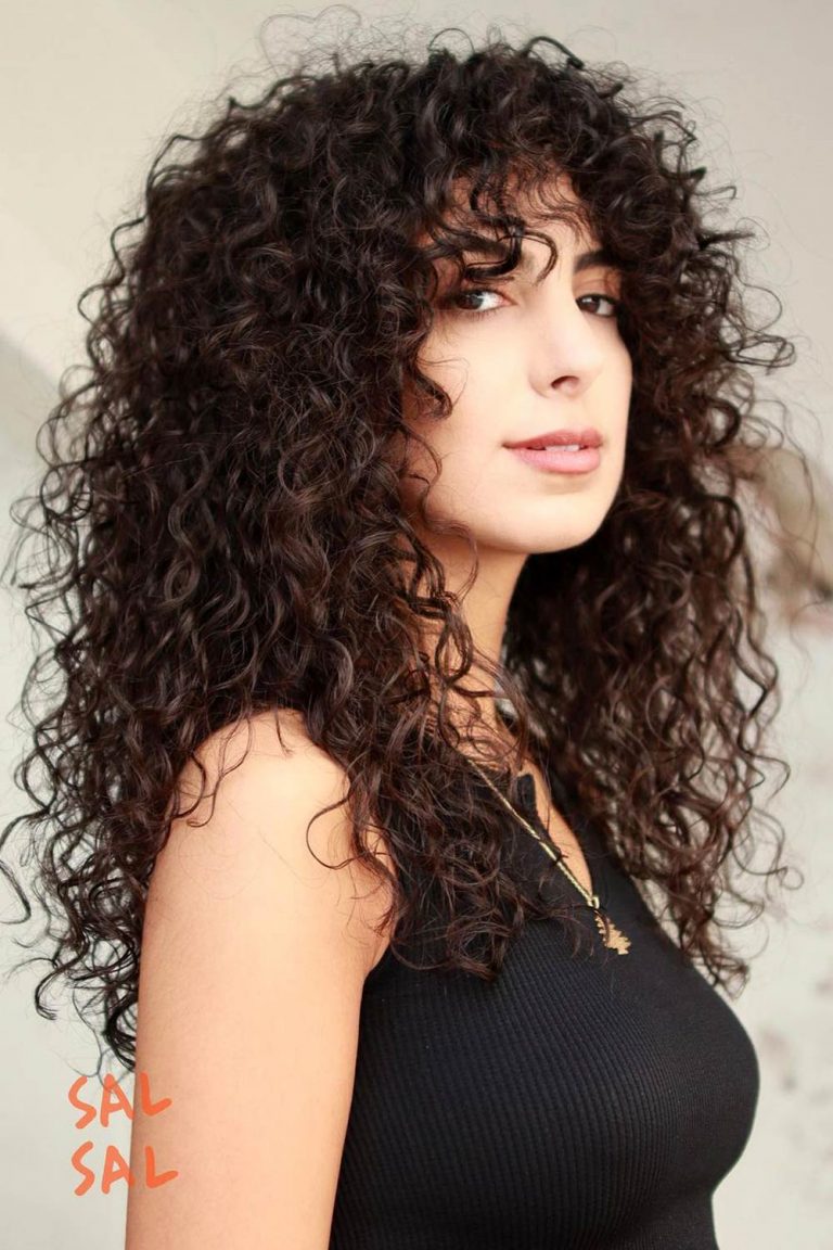 Implement Curly Bangs In Your Outlook and Enjoy The Flattering Effect