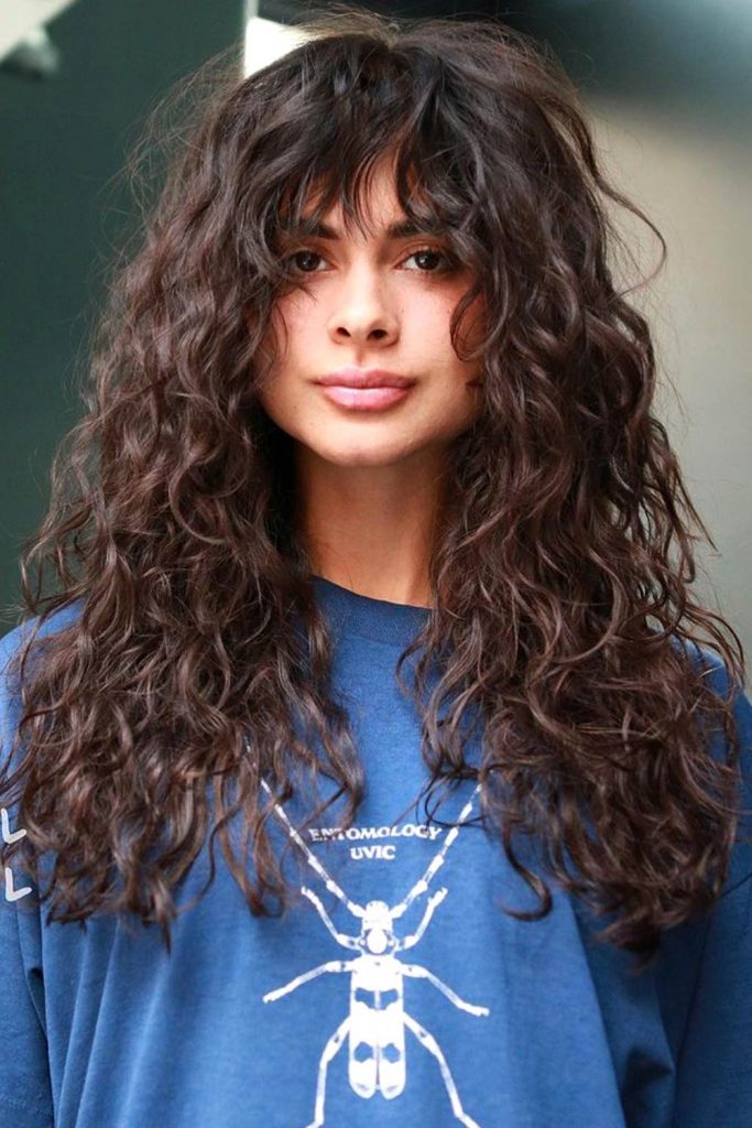 Implement Curly Bangs In Your Outlook and Enjoy The Flattering Effect