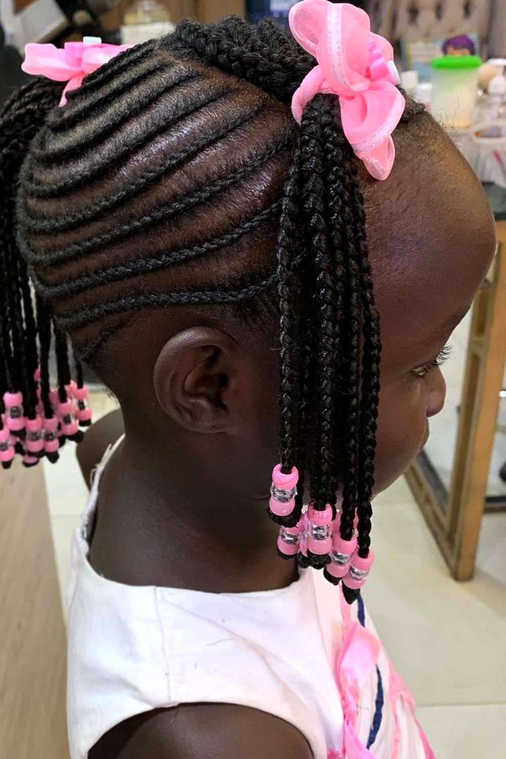 Ponytails and Beads mix in Cornrows