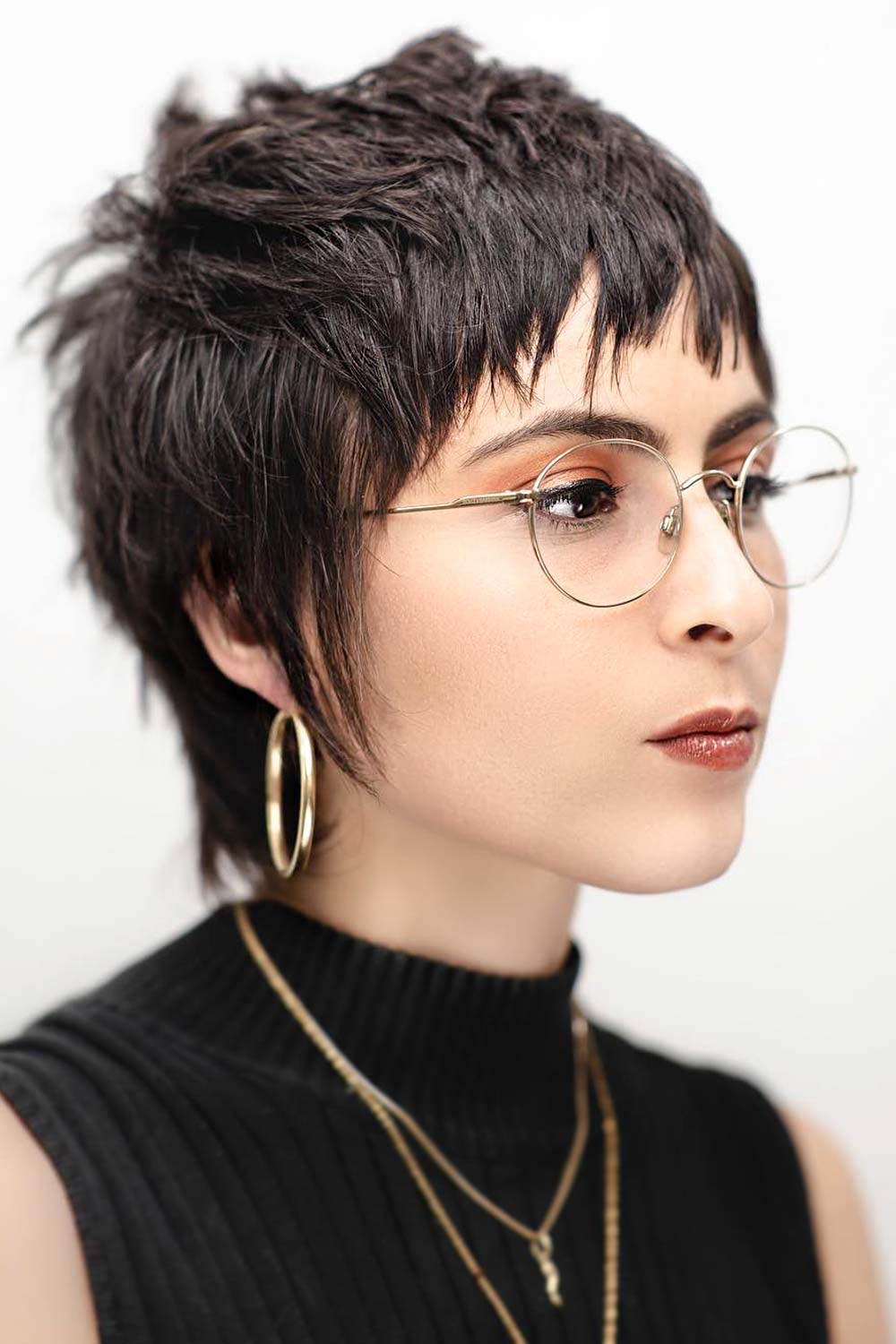 pixie cut with long sideburns