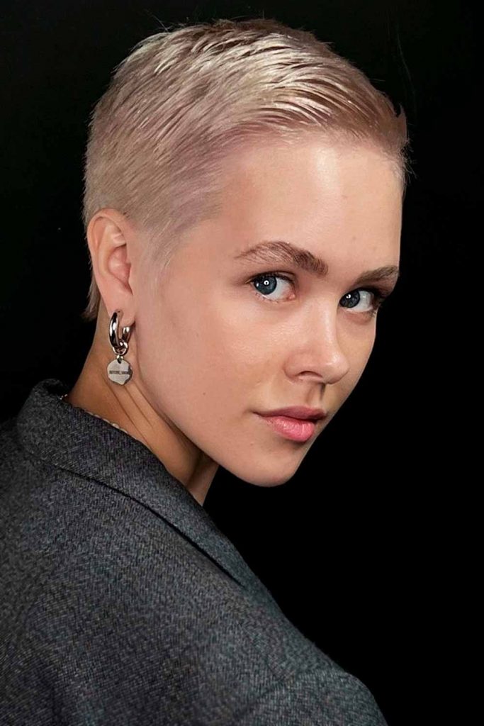 Slicked-Down Pixie with Side Part #androgynoushaircuts #androgynoushairstyles