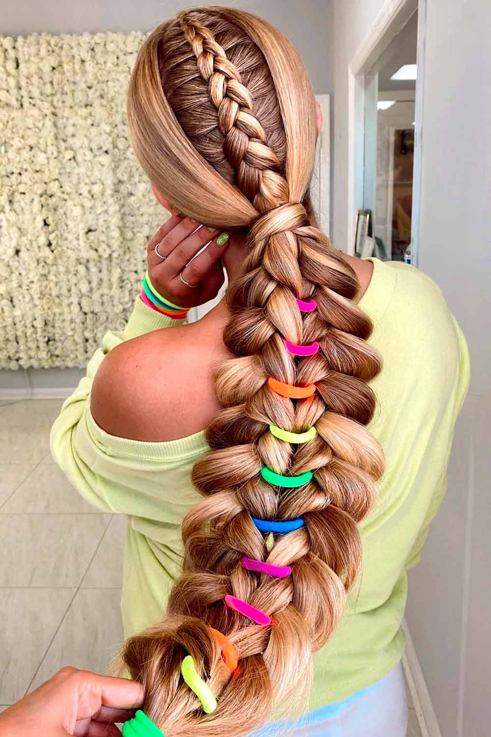 Close Up Of Braid Hair Of Little Girl With Colorful Rubber Bands