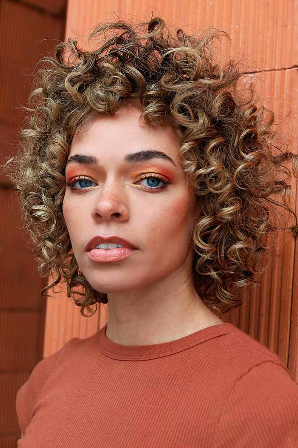Short Curly Bob With Baby Bangs #curlybob #haircuts #bobhaircuts #curlyhairstyles