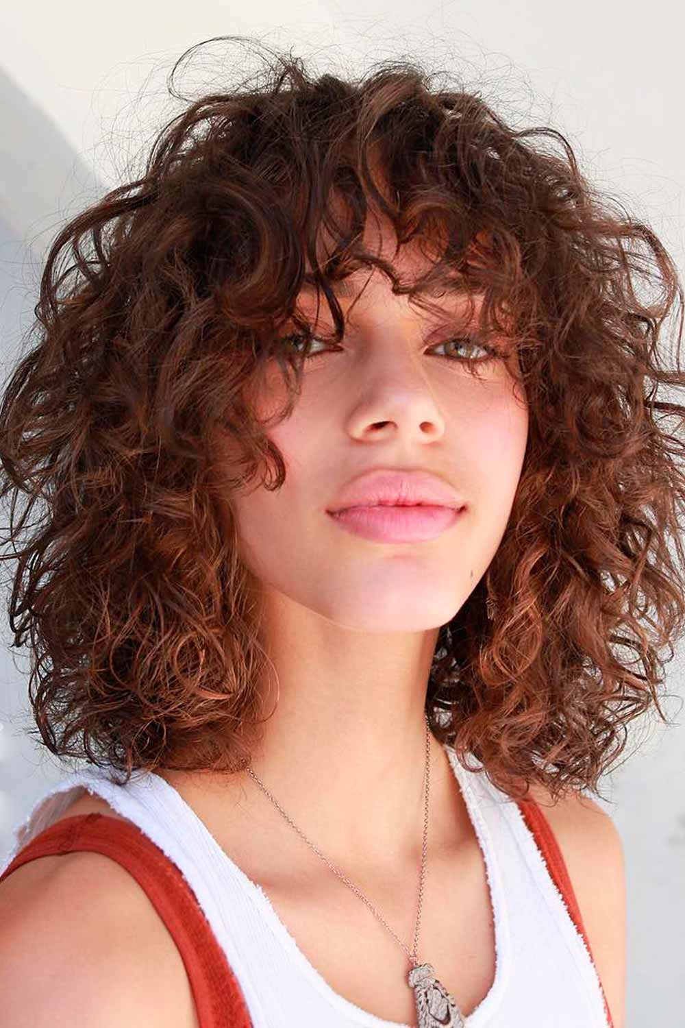 Well-Balanced Rounded Bob With Wavy Bangs #curlybob #haircuts #bobhaircuts #curlyhairstyles