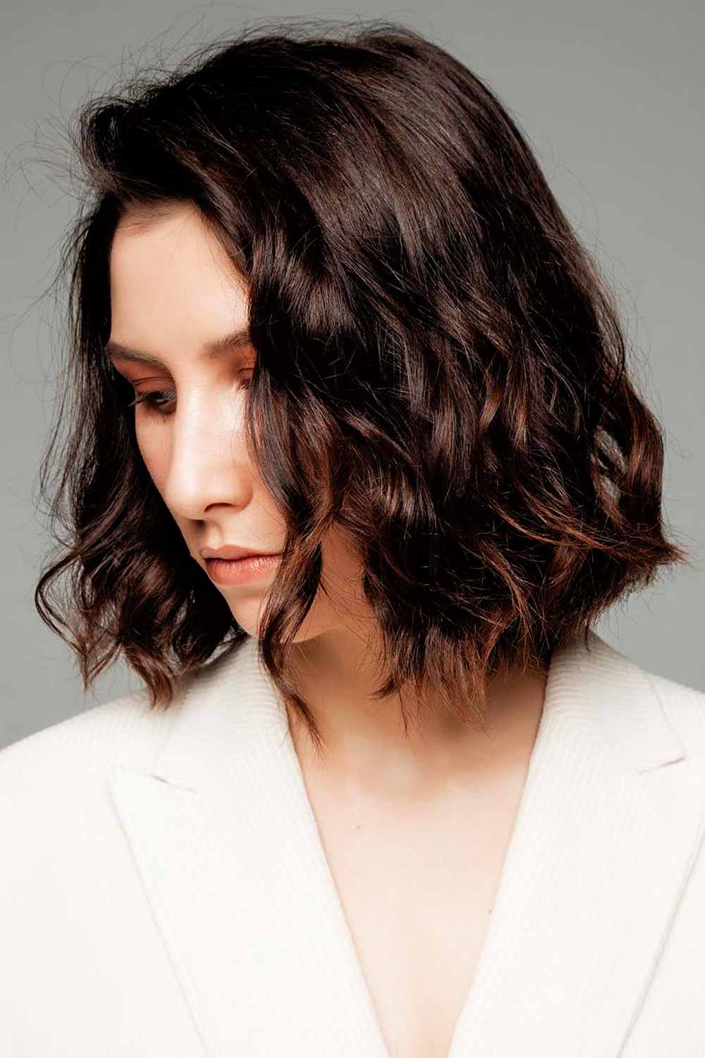 Choppy Angled Curly Bob #curlybob #haircuts #bobhaircuts #curlyhairstyles