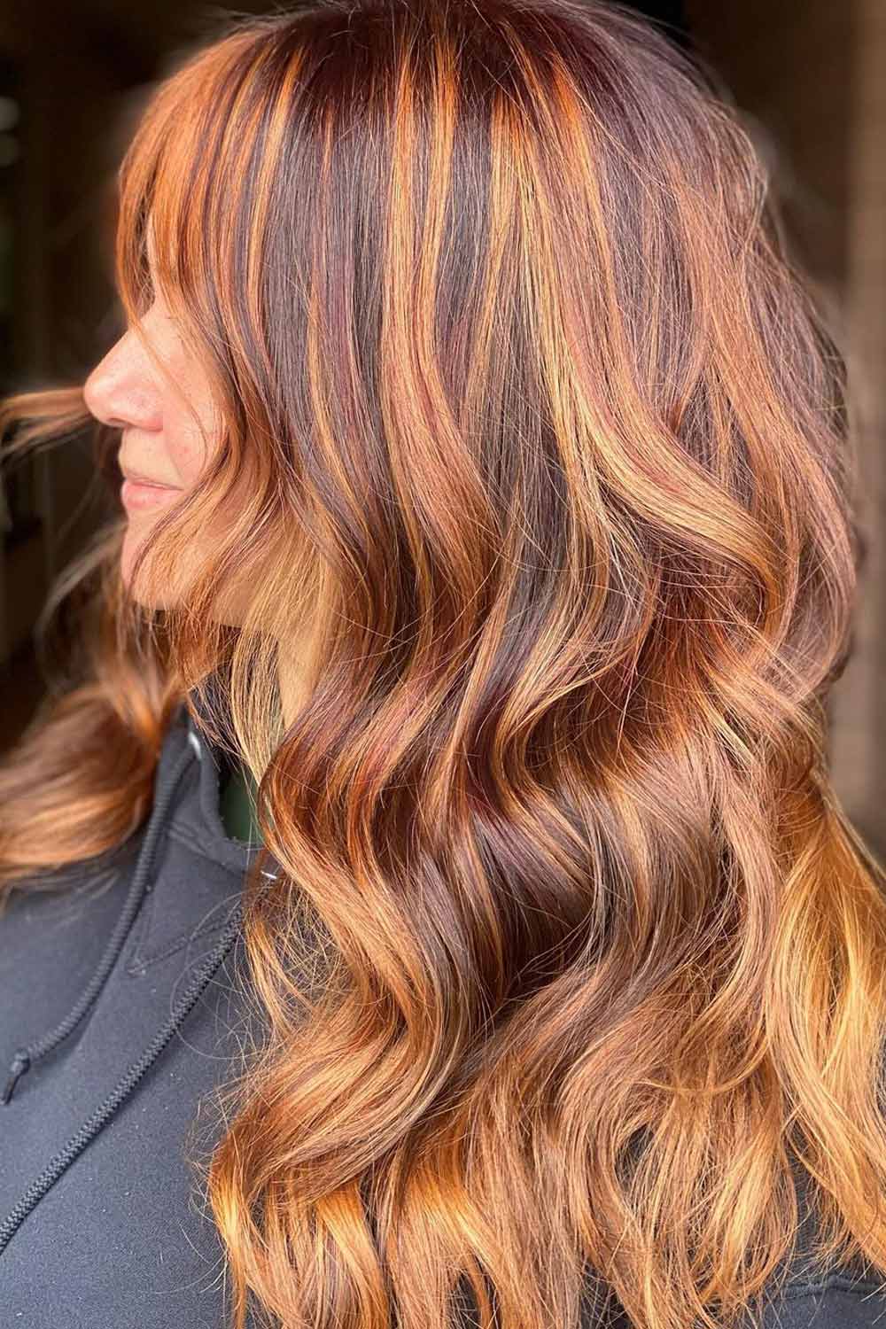 Brown Balayage with Bold Copper Highlights