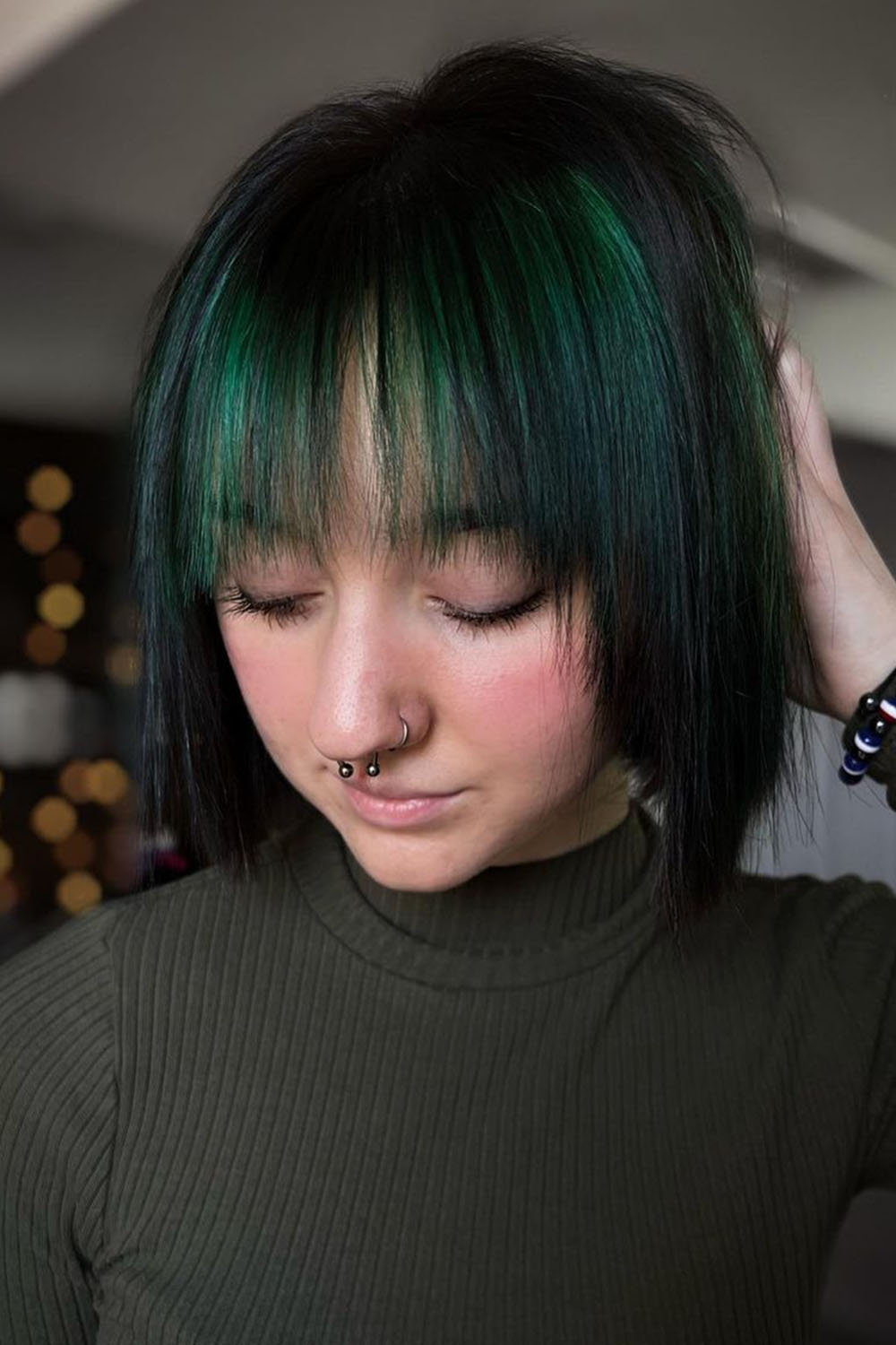 black hair green bangs