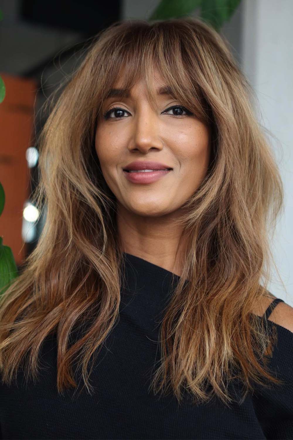 Light Caramel Hair With Wispy Bangs