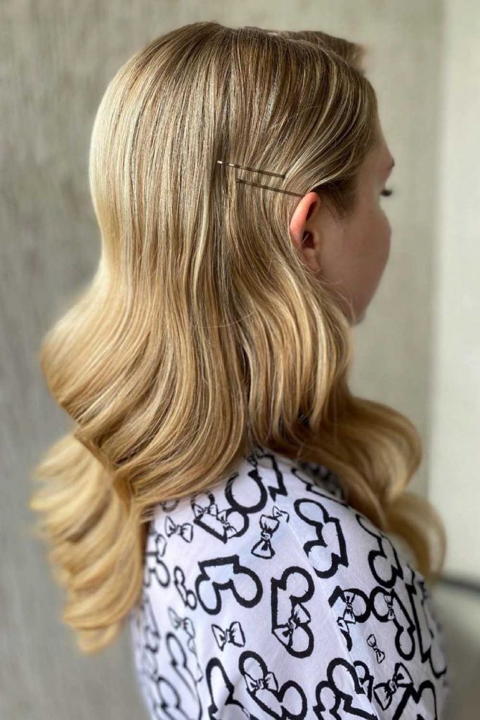 Sleek Blonde Wavy Hairstyle