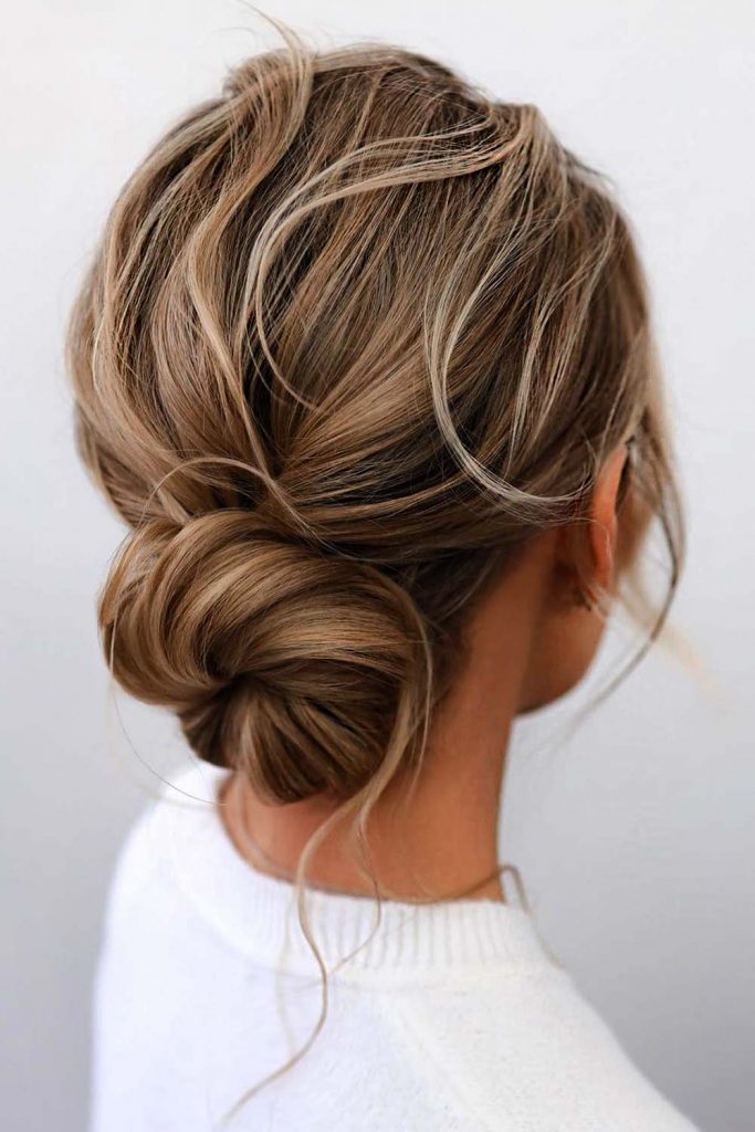 Low Messy Hair Bun For Casual Looks 