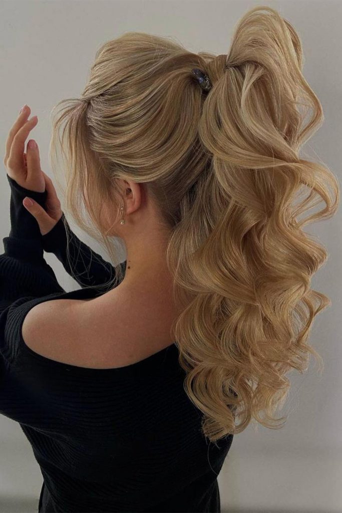 Wavy Half Up Half Down Wedding Hairstyle with Side Curl