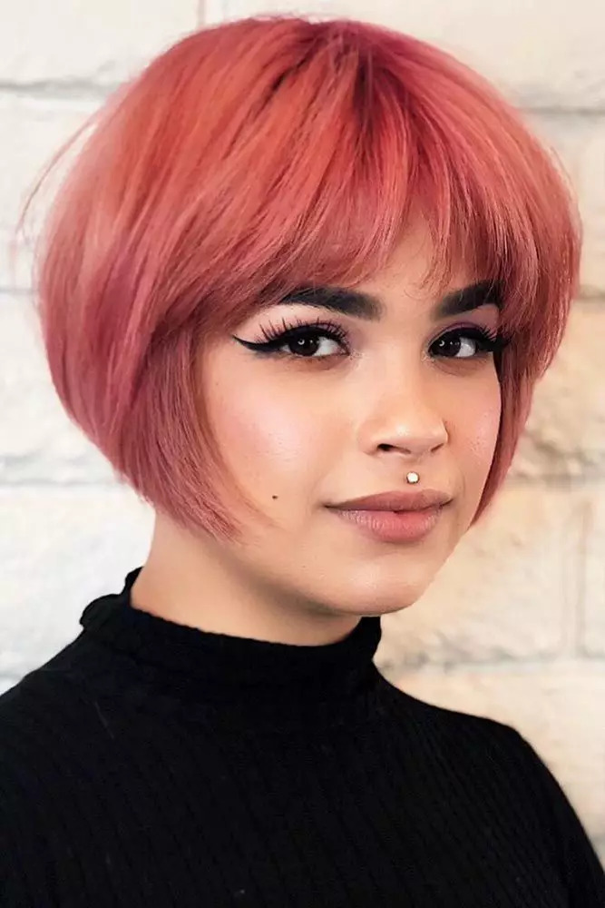 Pink Bob Hairstyle With Curtain Bangs 