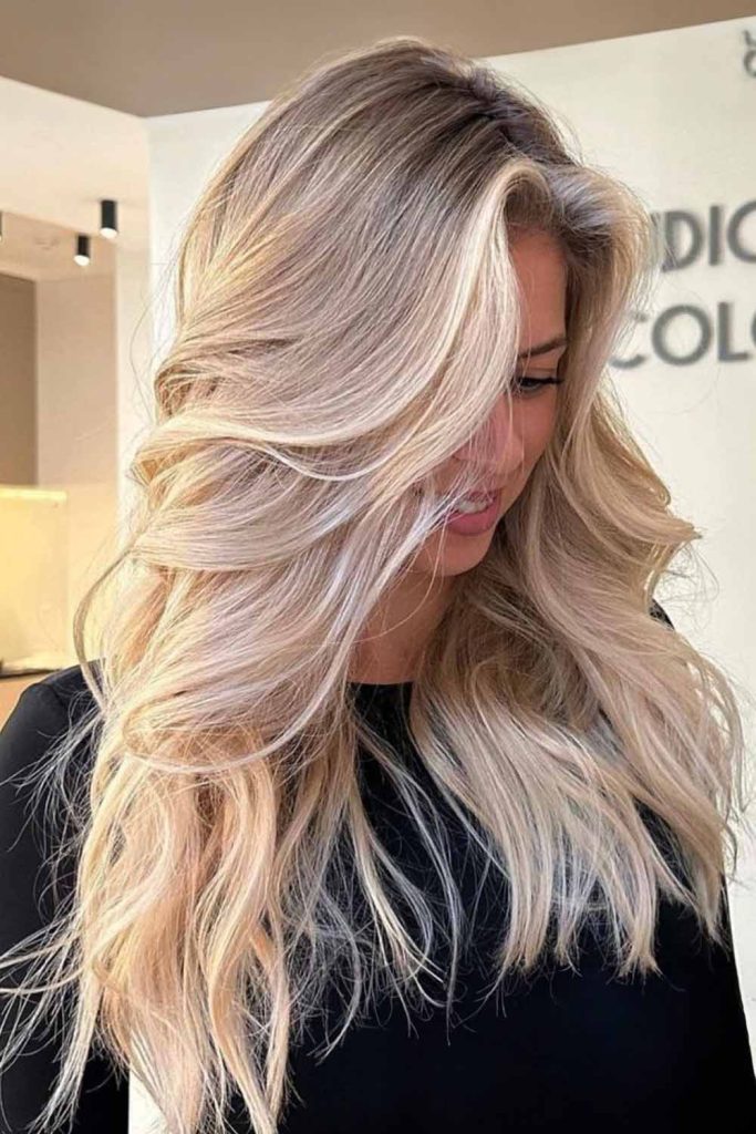Platinum Blonde On Long Hair With Side Layers