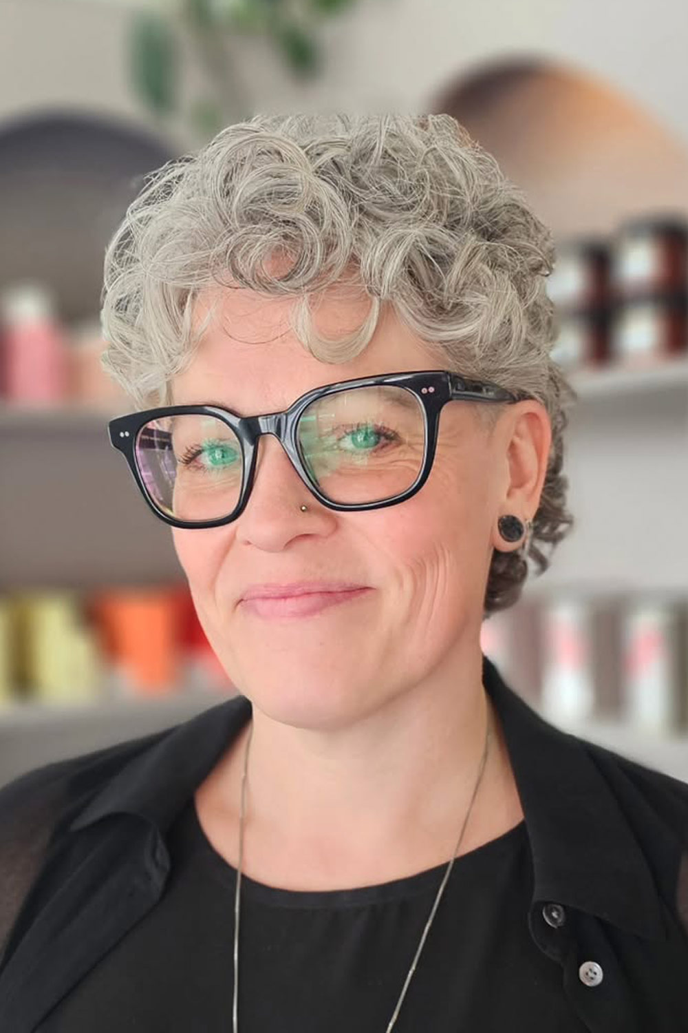 Short Mullet With Curly Bangs for a Bold Modern Style